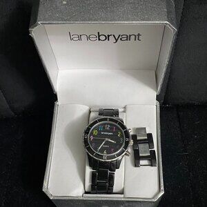 NWOT - Black watch with sparkling colors for numbers, extra links for sizing.